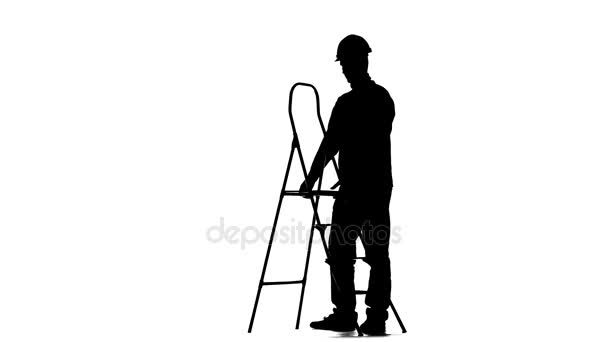 Builder folds the ladder. Silhouette. White background — Stock Video