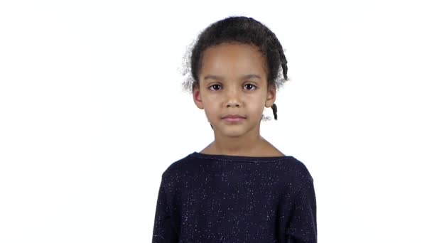 Baby of an african american smiles shes happy. White background. Slow motion — Stock Video