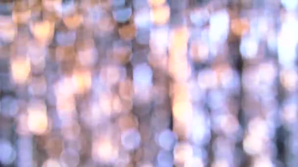 Абстрактний світлий багатокольоровий фон боке світиться напис Ho Ho Ho Ho — стокове відео