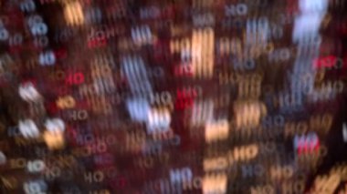 Çeşitli renklerde ışık yazıt ho ho ho komik kutlama soyut dekorasyon, parlak bokeh arka plan bulanık