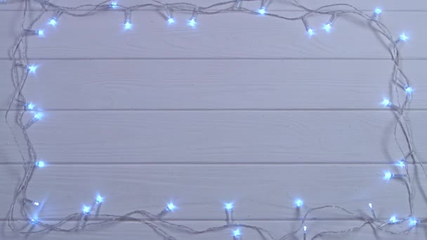 Mockup neve branca guirlanda de Natal queima com cores brilhantes. Vista superior — Vídeo de Stock