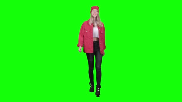 Girl meets his friends and waving them greetings. Green screen — Stock Video