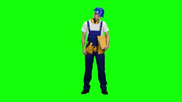 Foreman holds a folder in his hands and shows a ok. Green screen — Stock Video