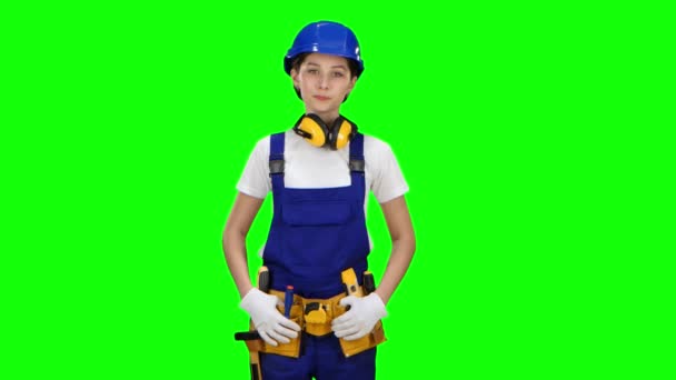 Girl shows them a gesture with her hands cross to the cross. Green screen — Stock Video