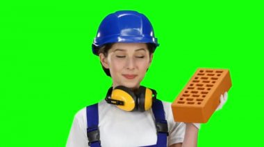 Kız Oluşturucu bir tuğla inşaat ve Haritayı thrumbs için taşır. Yeşil ekran