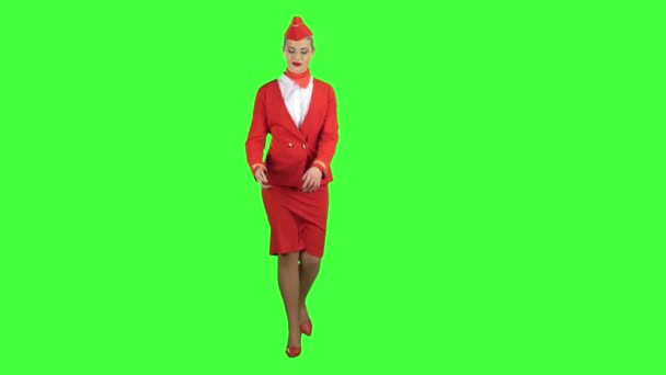 Woman steps with the phone and writes a message . Green screen — Stock Video