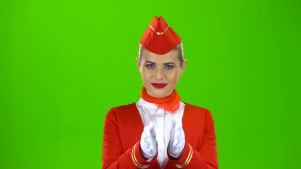 Hol van a vészkijárat stewardess-kézmozdulatok. Zöld képernyő — Stock videók