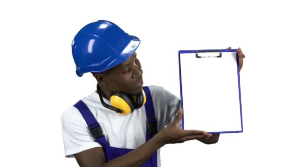 Engineer african american raises the paper tablet . Alpha channel — Stock Video