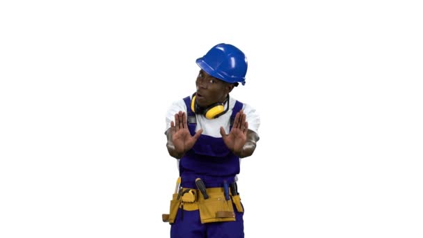 African American engineer in the helmet shows the cross crosswise. Alpha channel — Stock Video