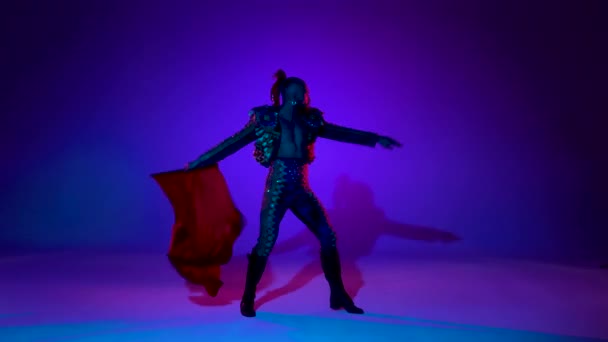 Torero in blue and gold suit or typical spanish bullfighter isolated over on a blue background. — Stock Video