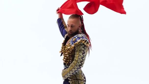 Torero in blue and gold suit or typical spanish bullfighter isolated over white studio background. Close up, slow motion. — 비디오
