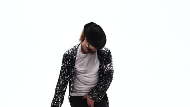 Young stylish teenager is showing dance moves like Michael Jackson. Isolated over white background. Close up, slow motion. — Stock Video