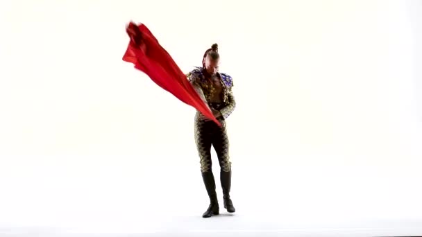 Torero in blue and gold suit or typical spanish bullfighter isolated over white studio background. Silhouette — Stock Video