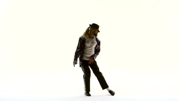 Young stylish teenager is showing dance moves like Michael Jackson. Isolated over white background. Close up, slow motion. — Stock Video