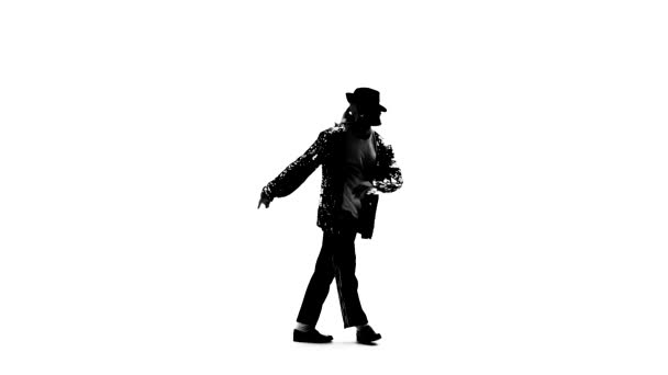 Silhouette egy fiatal férfi táncos tánc stílusban Michael Jackson fehér háttérrel. Bezárás, lassított felvétel.. — Stock videók