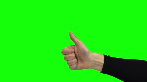 Hand van een man die duim omhoog demonstreert. Groen scherm. Sluiten. — Stockvideo