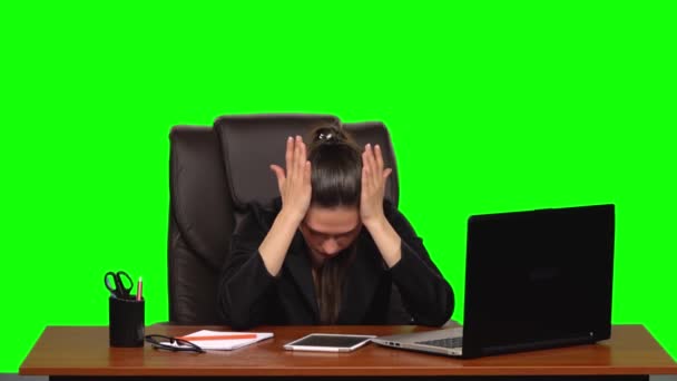 Business woman in the workplace feels tired after a hard working day. Green screen. Studio. Slow motion — ストック動画