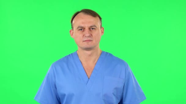 Tıp adamı hayal kırıklığına uğramış bir şekilde "Aman Tanrım" diyor. Yeşil Ekran — Stok video