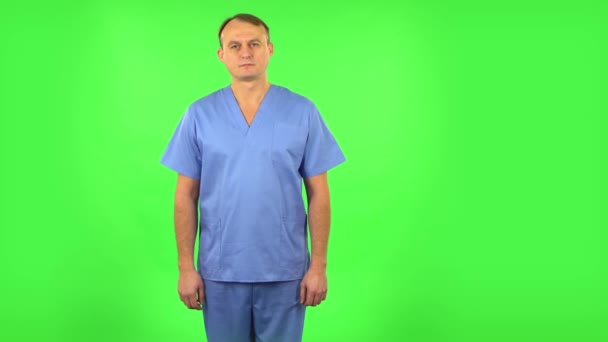 Medical man disappointedly waves his hands and says oh my good. Green screen — 비디오