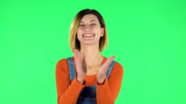 Girl claps her hands with wow happy joy and delight. Green screen