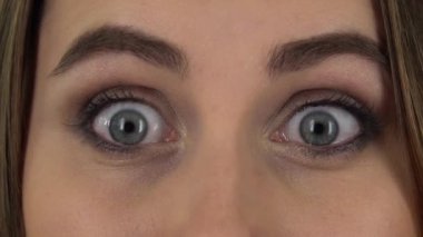 Girl looking scared at the camera. Close up