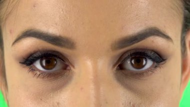 Girl looking scared at the camera. Close up