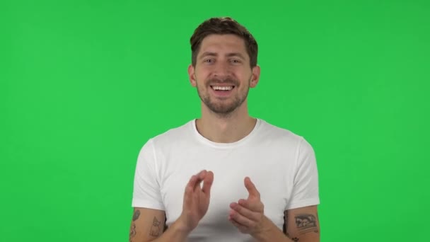 Portrait of confident guy is clapping his hands with wow happy joy and delight. Green screen — Wideo stockowe