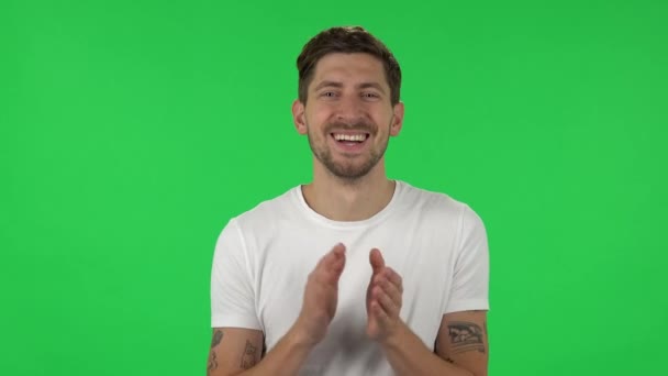 Portrait of confident guy is clapping his hands with wow happy joy and delight. Green screen — Stockvideo
