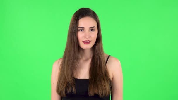 Woman in anticipation of worries, then disappointed and upset. Green screen — Stock Video