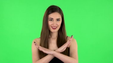 Elleri çapraz hareket eden bir kadın X şeklini alırsa reddeder ve hayır der. Yeşil Ekran