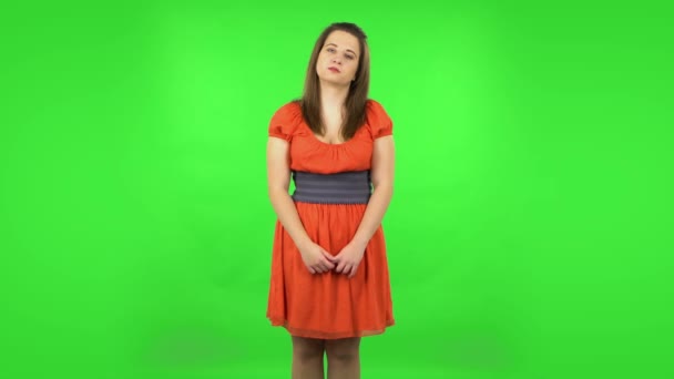 Cute girl is tired and sighs. Green screen — Αρχείο Βίντεο