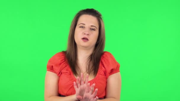 Portrait of cute girl strictly gesturing with hands shape meaning denial saying NO. Green screen — Αρχείο Βίντεο