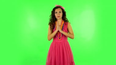 Girl waiting in anticipation with pleasure. Green screen