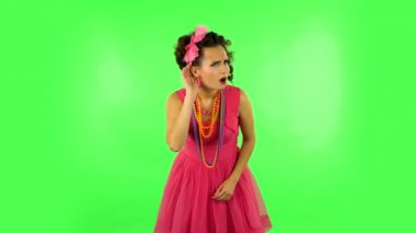 Woman holding hand near ear trying to listen interesting news expressing wow communication concept, gossip. Greenscreen