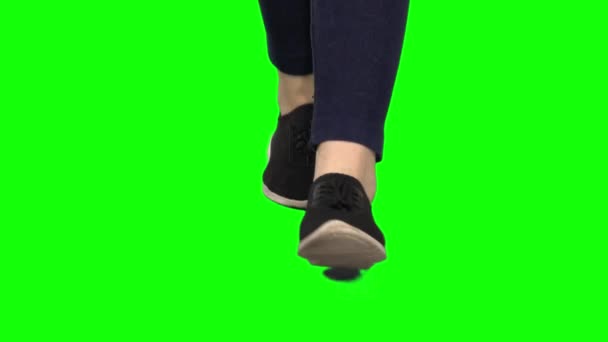 Woman legs close up against the green screen. — Stock Video