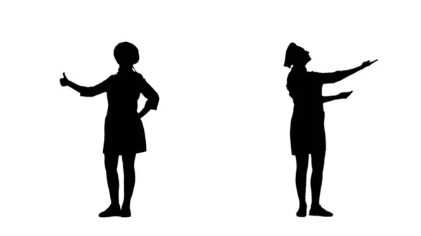 Two black silhouettes of chef woman gesticulating praising their dishes. — Stock Photo, Image