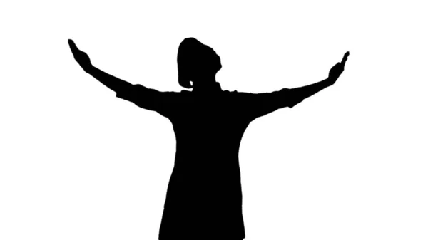 Portrait of black silhouette of cook girl raising hands and head up. — Stock Photo, Image