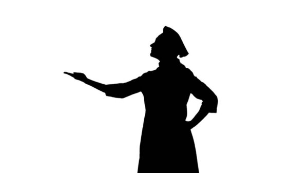 Portrait of black silhouette cook girl in toque is gesticulating praising their dishes on white background. Profile view