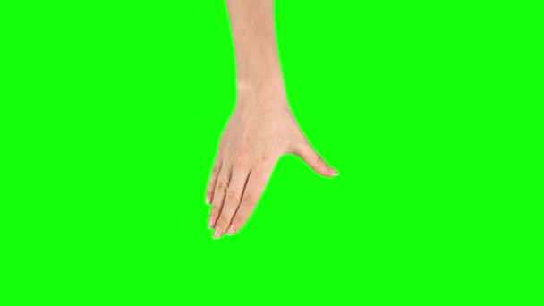 A mão feminina está realizando uma pitada de 5x no gesto da tela do tablet na tela verde. Fechar — Vídeo de Stock