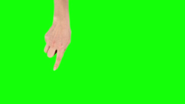 La mano femenina está realizando pan izquierda y derecha, doble deslizamiento izquierda y derecha en el gesto de la pantalla de la tableta en la pantalla verde. De cerca. — Vídeo de stock