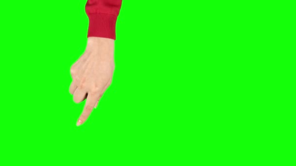 Женская рука в красном свитере выполняет кастрюлю слева и справа, двойной жест на экране планшета. Хрома-ключ. Закрыть — стоковое видео