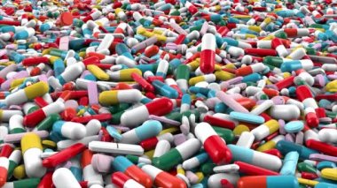 Farklı renkte ilaç kapsülleri ve haplar yığını. Çok az renkli hap yığının üzerine düşer. Parlak kapatma arkaplanına sahip 3B görüntüleme.