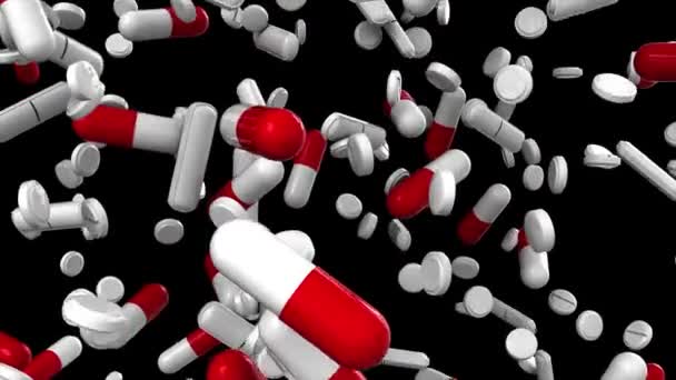 White and red pharmaceutical capsules and pills fall down against the black background. 3D rendering with glossy closeup and alpha channel. — Stock Video