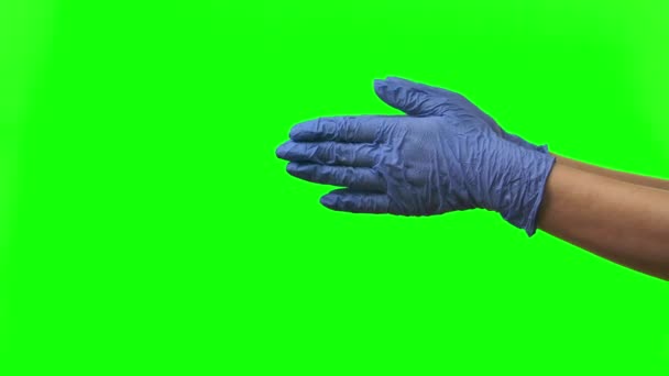 Doctors female hands in blue gloves are clapping. Green screen. Close up — Stock Video