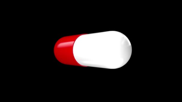 Witte rode farmaceutische capsule draait geïsoleerd op de zwarte achtergrond. 3D rendering close-up met alfa kanaal. — Stockvideo