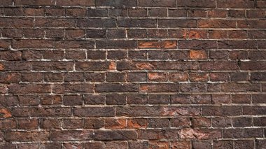 Soyut tuğla duvar arkaplanı, yakın plan. Kırmızı tuğla duvar dokusu.