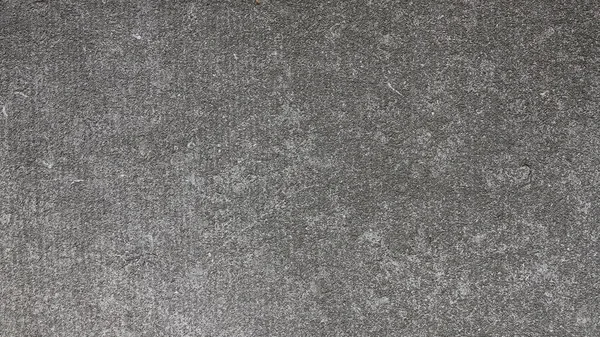 Background texture of rough gray asphalt