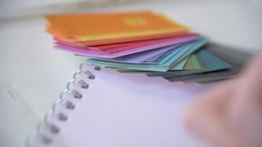 A close shot tracking over a designer creating a technical drawing