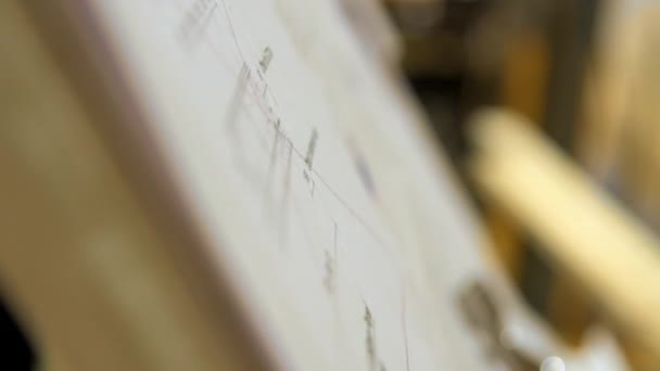 Photo de suivi portative d'un plan dans un atelier de construction