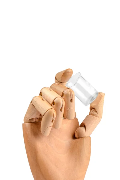 Ξύλινο χέρι κατασκευασμένο με ένα ποτήρι ζέσεως — Φωτογραφία Αρχείου